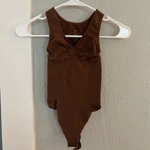 SKIMS Seamless Sculpt Thong Bodysuit, Color (according to SKIMS website): Jasper